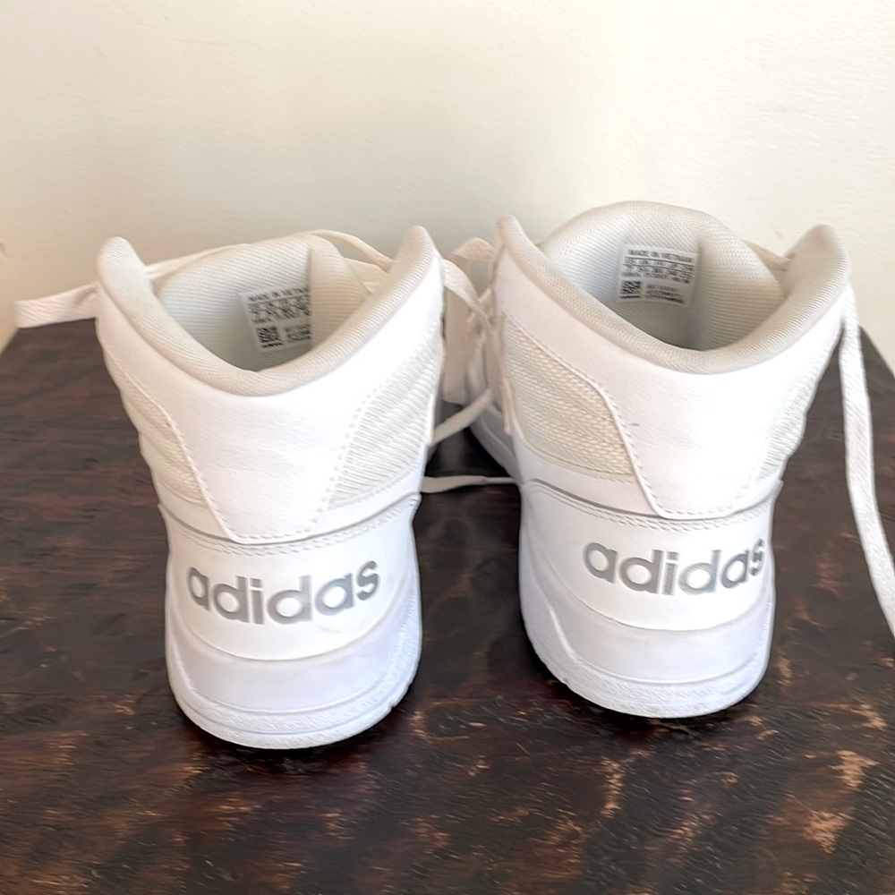 White adidas high tops.  Shoe size 7